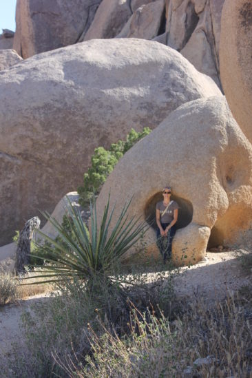 Alicia Sitting in a Divot in a Rock - Split Rock Trail